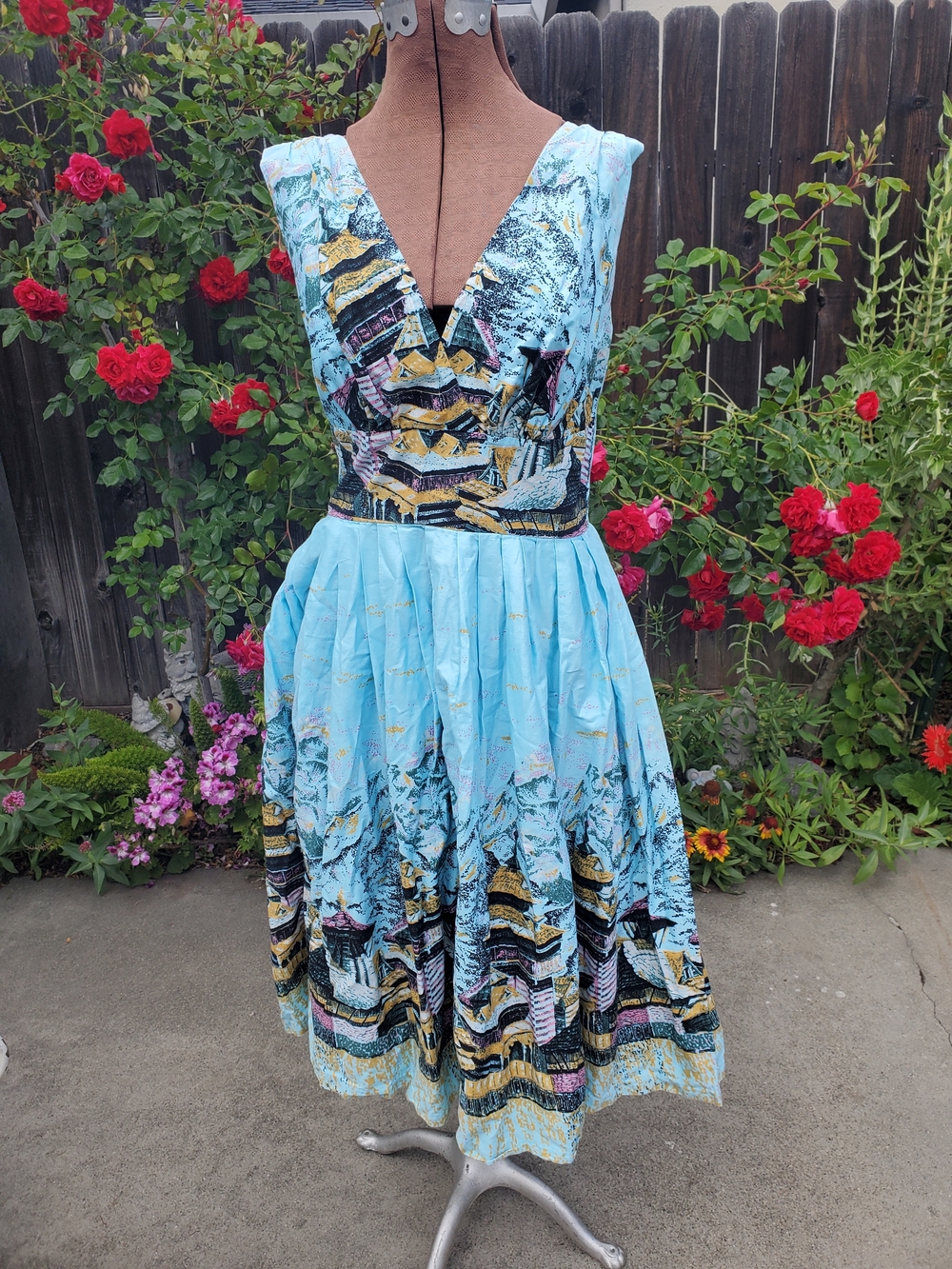 Retrospec'd Sky Blue Printed V-Neck Midi Dress with Patterned Accents